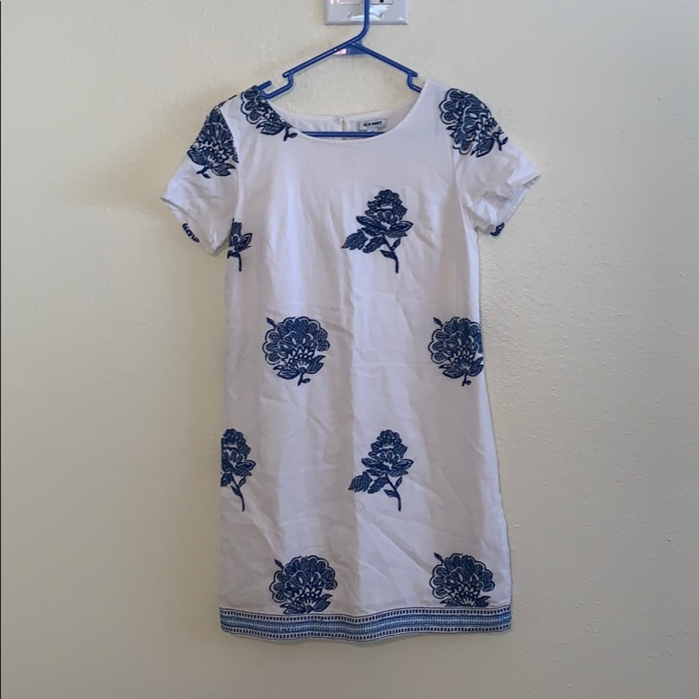 White dress with floral designs